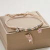 A new and unique cartoon cat bracelet from Japan and South Korea, with a simple and elegant design. It is a woven bracelet featuring a little cat pendant Specification image